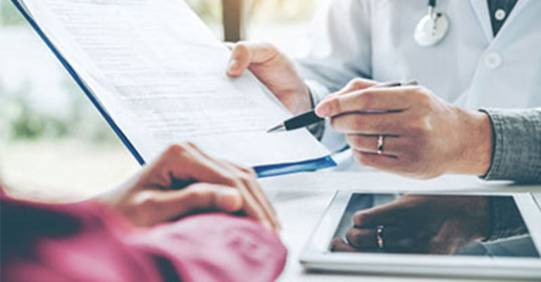 Doctor consulting a patient on medically assisted addiction treatment
